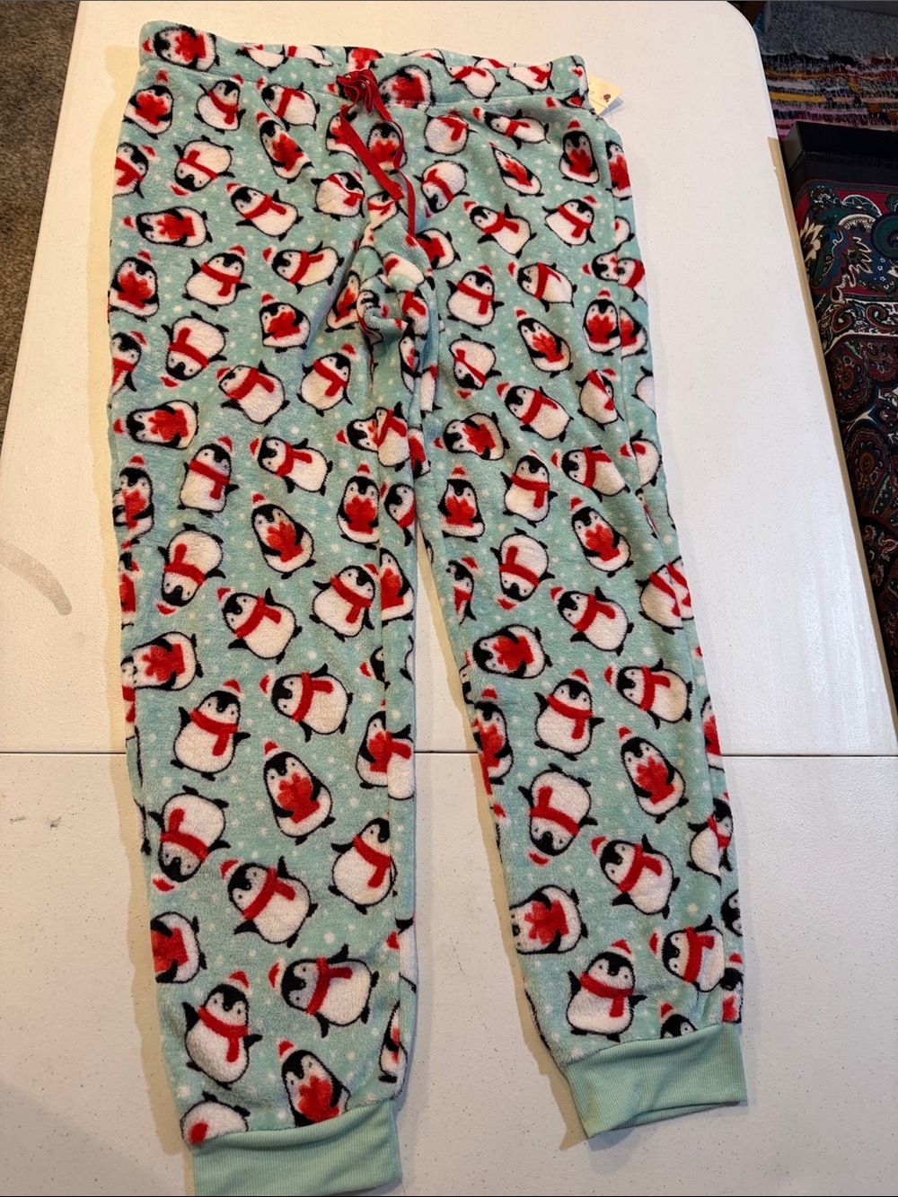 #603. Fuzzy penguin pajama pants. Large